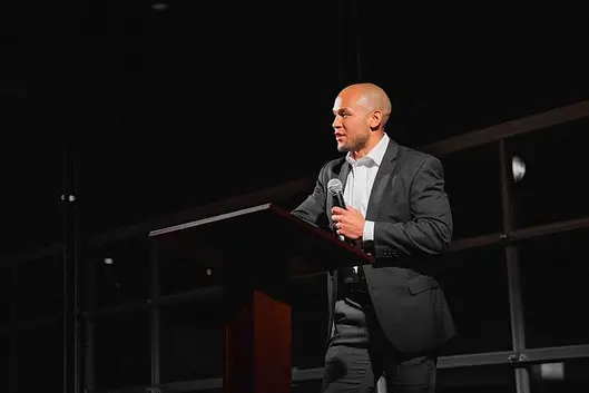 Speaking-event photograph from PJ’s original story page