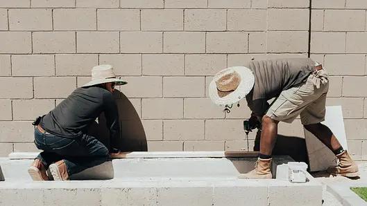 Hands-on masonry work shown in PJ’s original story